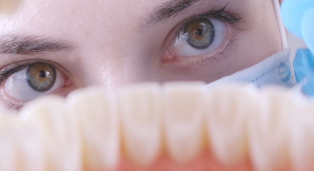 Close-up of a dentist looking at patient's teeth